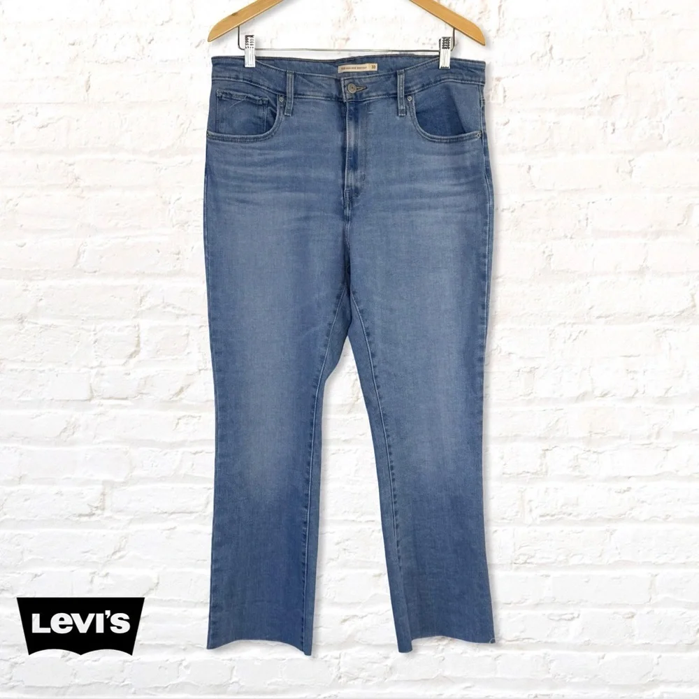 Levi’s 725 High Rise Bootcut Jeans 33 – Cropped Raw Hem Light Wash